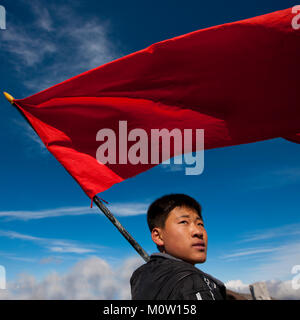 North Korean student with red flag in mount Paektu, Ryanggang Province, Mount Paektu, North Korea Stock Photo