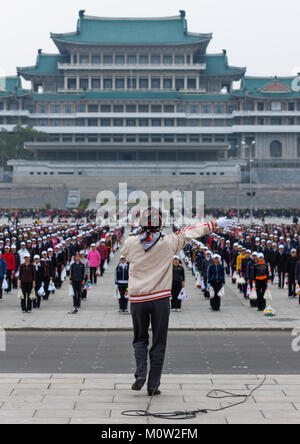 Young North Korean women during a mass games rehearsal in Kim il Sung square, Pyongan Province, Pyongyang, North Korea Stock Photo