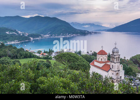 View on Bay of Kotor with Great Temple of Dormition of Mother of God in Savina Monastery in Savinska Dubrava park in Herceg Novi, Montenegro Stock Photo