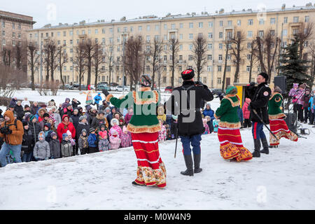 ST. PETERSBURG, RUSSIA-FEB 22, 2017: Street party with songs and dances is during the Carnival celebration of Maslenitsa. It is an Eastern Slavic reli Stock Photo