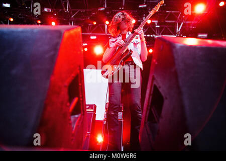 The English doom metal band Electric Wizard performs a live concert at the Arena Stage at Roskilde Festival 2014. Here lead bassist Clayton Burgess is pictured live on stage. Denmark 03.07.2014. Stock Photo