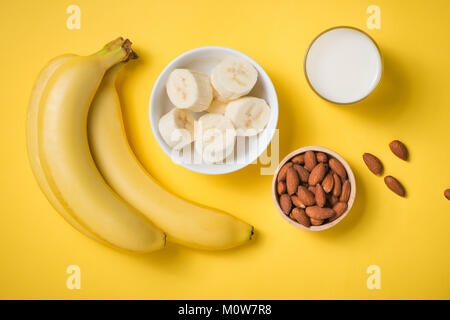 Banana and banana slices on a ceramic disk. Stock Photo