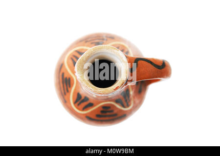 Ceramic painted, traditional jug on white background, view from above Stock Photo