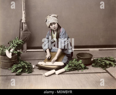 c. 1880s Japan - young woman preparing vegetables Stock Photo