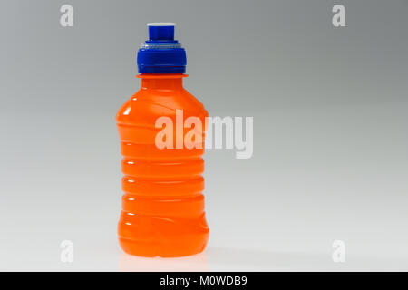 A range of plastic drinking bottles empty and non labelled ready for recycling on white background. Stock Photo