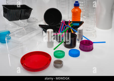 A selection of household consumer  plastic products on a white background ready for recycling. Stock Photo