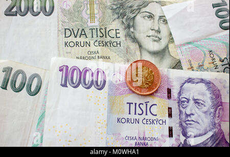 Czech coin on the various Czech banknotes money like background. Stock Photo