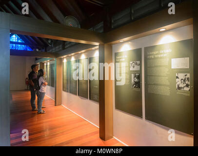 Tourists visiting the museum at Sandakan Memorial Park, on the Heritage Trail, Sandakan, Sabah, Borneo, Malaysia Stock Photo