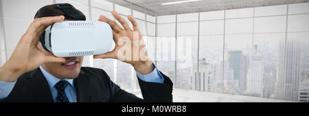Composite image of close up of businessman wearing vr glasses Stock Photo