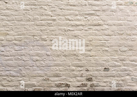 Horizontal part of old white brick wall Stock Photo