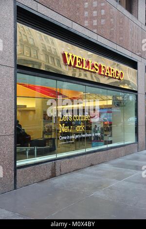 NEW YORK - JUNE 10: Wells Fargo Bank branch on June 10, 2013 in New York. Wells Fargo was the 23rd largest company in the United States in 2011 (by re Stock Photo