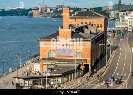 Sweden,Stockholm,island of Sodermalm,the Photographic Museum Fotografiska installed on the quays at Stadsgården in an old Art Nouveau industrial building used as a customs house dating from 1906 Stock Photo