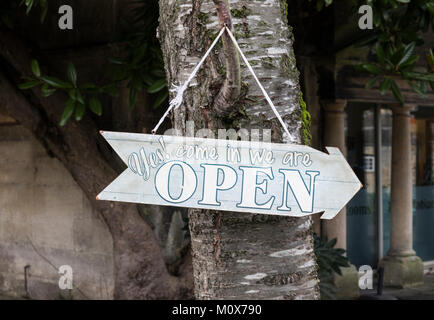 Wooden sign in Bradford on Avon saying 'yes, come in we are open', Wiltshire, England, UK Stock Photo