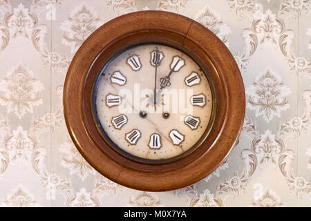 The vintage clock on the wall, One o'clock Stock Photo