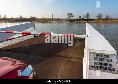 On board of Ferry, ferry bridge, ferryboat crossing river Maas, the meuse, Berg aan de maas, border between Netherlands and Belgium. Stock Photo