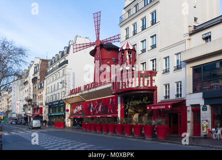 The Moulin Rouge , Paris, France. It is a famous cabaret built in 1889, locating in the Paris red-light district of Pigalle Stock Photo