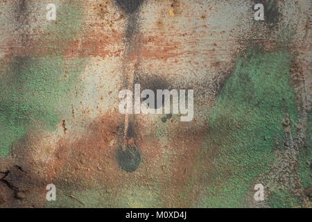 Abstract grunge background soft delicate color spots of green and red on beige. Stock Photo