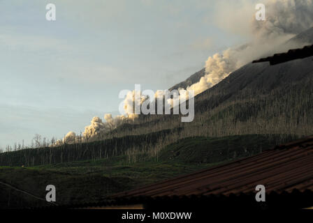 Indonesia. 24th Jan, 2018. Lava flows don't cool instantaneously. It can take days to years for a lava flow to completely cool. Lava flows are streams of molten rock that pour or ooze from an erupting vent. Credit: Sabirin Manurung/Pacific Press/Alamy Live News Stock Photo