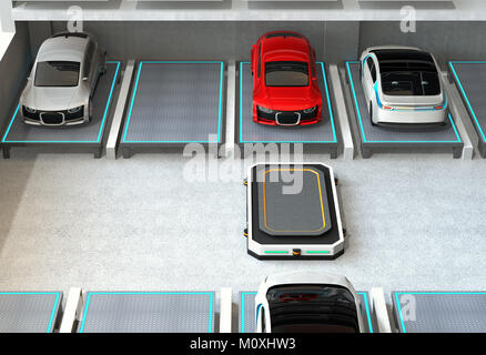 Automated Guided Vehicle (AGV) leaving the parking space to picking next car. Concept for automatic car parking system. Stock Photo