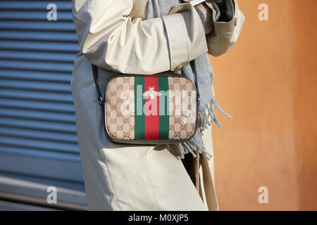 milan january 13 woman with gucci bag with bee and green and red stripes