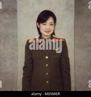 Polaroid of a North Korean guide called Kim at the victorious fatherland liberation war museum, Pyongan Province, Pyongyang, North Korea Stock Photo