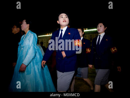 North Korean students dancing to celebrate april 15 the birth anniversary of Kim Il-sung on Kim il Sung square, Pyongan Province, Pyongyang, North Korea Stock Photo