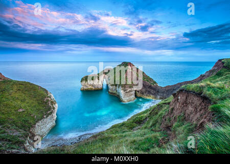 High Stacks arch at Flamborough Head, North Yorkshire. Also known as the drinking dinosaur. Stock Photo