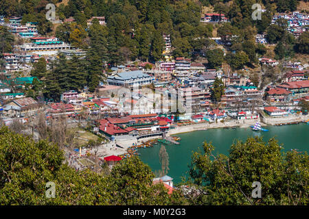 View of the shoreline of Nainital Lake with pleasure boats, Nainital, Uttarakhand, northern India, Ayerpatta in the Himalayan Kumaon foothills Stock Photo