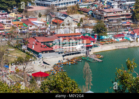 View of the shoreline of Nainital Lake with pleasure boats, Nainital, Uttarakhand, northern India, Ayerpatta in the Himalayan Kumaon foothills Stock Photo