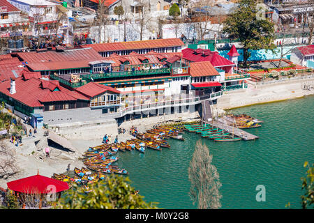 View of the shoreline of Nainital Lake with pleasure boats, Nainital, Uttarakhand, northern India, Ayerpatta in the Himalayan Kumaon foothills Stock Photo