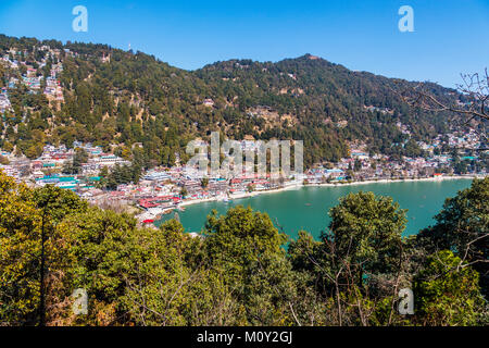 View of the shoreline of Nainital Lake and mountains in Nainital, Ayerpatta, Uttarakhand, north India, a hill station in Himalayan Kumaon foothills Stock Photo