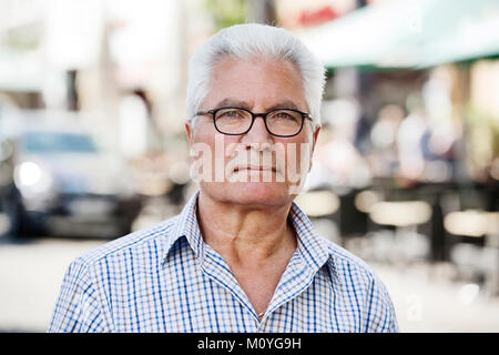 Grey-haired Senior with migration background,native Italian,portrait,Cologne,North Rhine-Westphalia,Germany Stock Photo