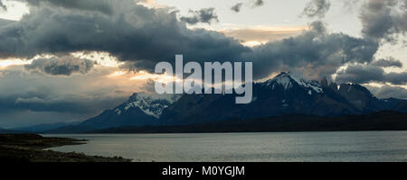 Glacial lake Sarmiento de Gamboa with the Cordillera del Paine mountain group in the evening light Stock Photo