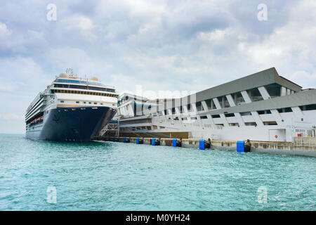 Luxury cruise ship at a passenger terminal in Singapore Stock Photo
