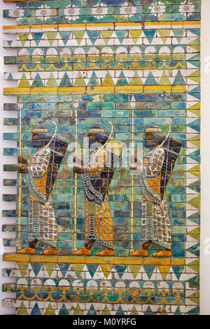 Three warriors on the Ishtar gates of Babylon build by  King Nebukadnezar II, 604-562 BC. Stock Photo