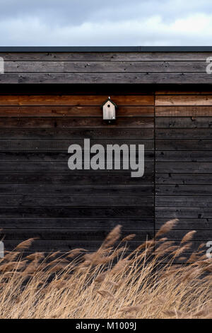 Essex UK.Wildlife Hide in Rainham Marshes RSPB nature reserve next to Thames Estuary in Purfleet, Bird nesting box on Bird sanctuary hide Stock Photo