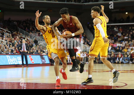January 26, 2018: Stanford Cardinal guard Isaac White (4) drives the lane between two defenders in the second half in the game between the Stanford Cardinal and the USC Trojans, The Galen Center in Los Angeles, CA
