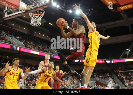 January 26, 2018: Stanford Cardinal guard Isaac White (4) drives to the hole past USC Trojans forward Nick Rakocevic (31) in the game between the Stanford Cardinal and the USC Trojans, The Galen Center in Los Angeles, CA Stock Photo