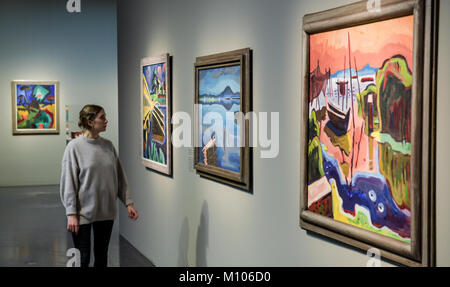 Hamburg, Germany. 25th Jan, 2018. Hamburg, Germany, 25 January 2018. A woman walking through the exhibition 'Karl Schmidt-Rottluff: expressive, magical, foreign' in the Bucerius Kunstforum in Hamburg, Germany, 25 January 2018. The works by the artist from the 'Die Bruecke' group of artists will be on display in Hamburg between 27 January and 21 March 2018. ATTENTION EDITORS: EDITORIAL USE ONLY IN CONNECTION WITH CURRENT REPORTING/MANDATORY CREDITS. Credit: Axel Heimken/dpa/Alamy Live News Stock Photo