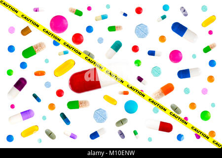Symbol image of drugs danger : Many colorful medicines. Pills and capsules on white background Stock Photo