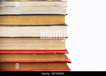 Pile of old vintage books isolated on white background Stock Photo