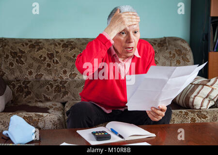 Shocking amount of bills an old lady has to pay for Stock Photo