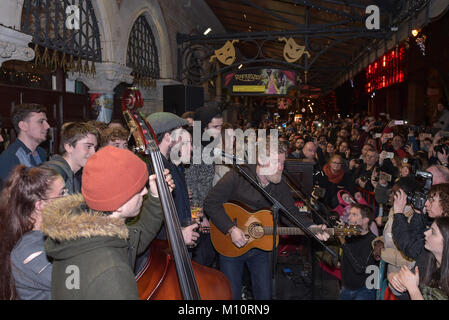 Hozier, Glen Hansard and the Corona's join the traditional Christmas Eve Busk in Dublin's Grafton Street area  Featuring: Danny O'Reilly, Hozier, Glen Hansard Where: Dublin, Ireland When: 24 Dec 2017 Credit: Brightspark Photos/WENN.com Stock Photo