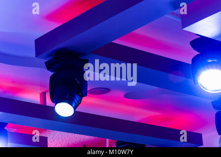 bar ceiling discoEmpty Night Club Lit by Colored Spotlights Stock Photo