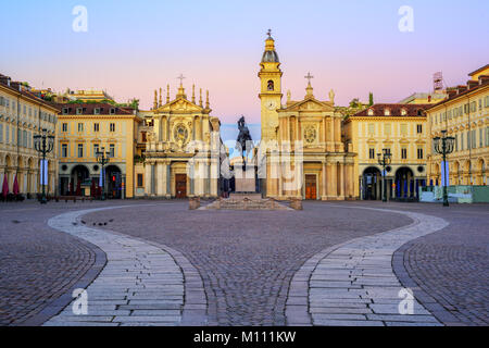 Piazza San Carlo square and twin churches of Santa Cristina and San Carlo Borromeo in the Old Town center of Turin, Italy, on sunrise Stock Photo