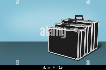 Construction, repair, tools - Three Grey black box case for tools on blue background. Stock Photo