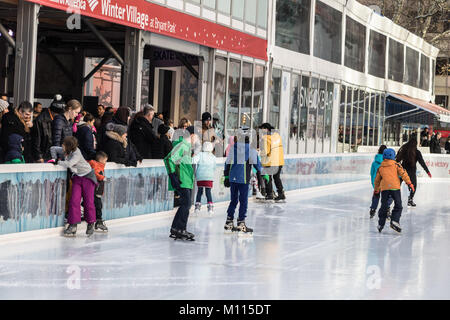 Skating at the Bryant Park ice rink, December 2017 Stock Photo