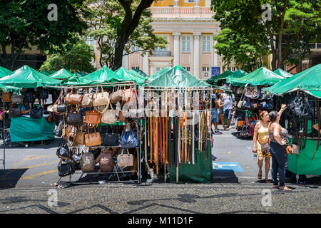 Belts and handbags on display for sale at a street market in Belo Horizonte, Minas Gerais, Brazil Stock Photo