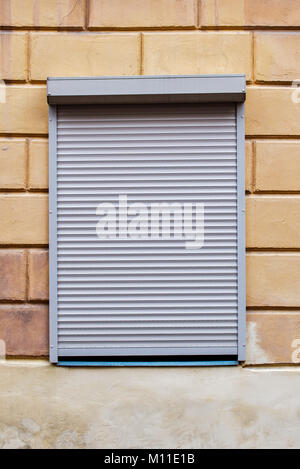 window with blinds on the wall Stock Photo