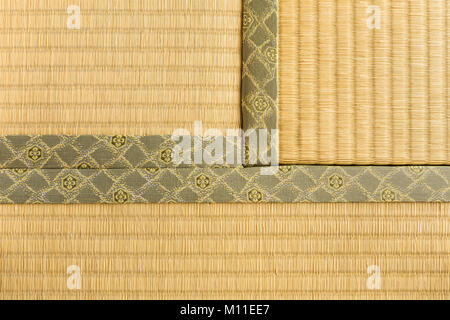 Hokkaido, Japan - 27 December 2017 - Three sections of tatami, japanese traditioanl room floor mat, lay flat against each other on the floor showing t Stock Photo